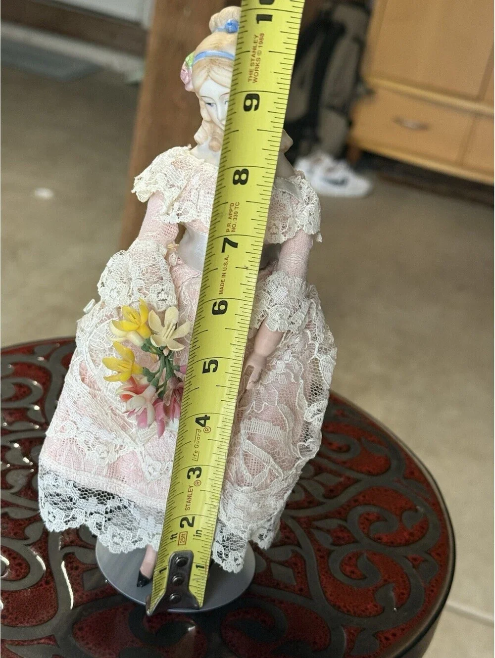 vtg porcelain doll Holding Flowers With Stand